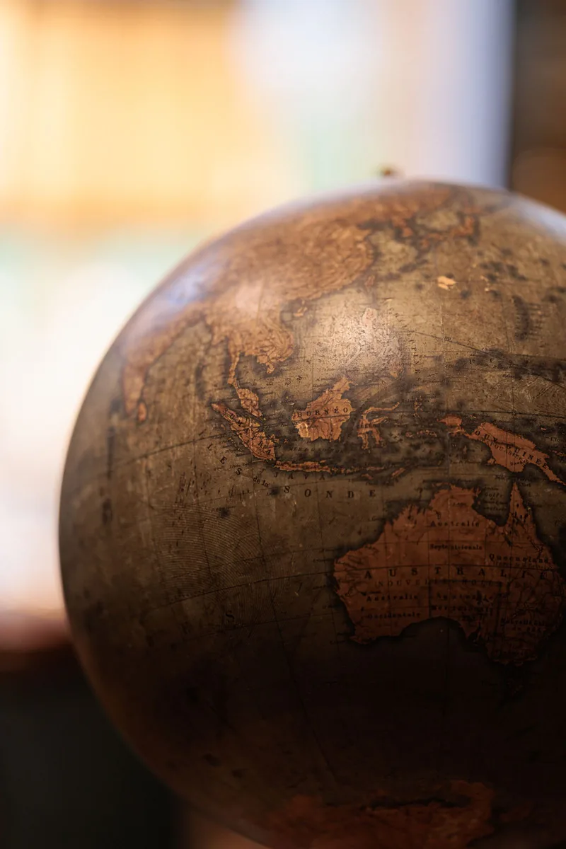 Worn antique globe showing Asia and Australia
